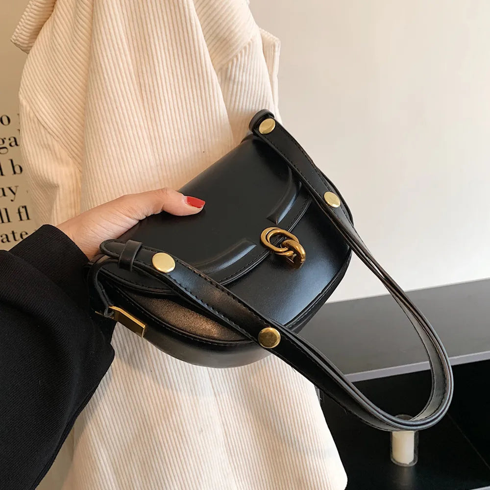 The Trendy Throwback: The PU Leather Saddle Crossbody Bag